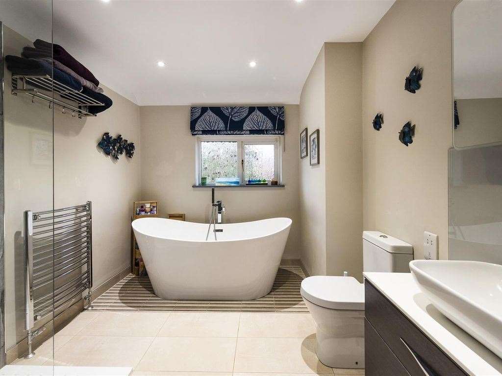 The bathrooms in this Tonbridge freehold are chic and modern. Photo: Zoopla