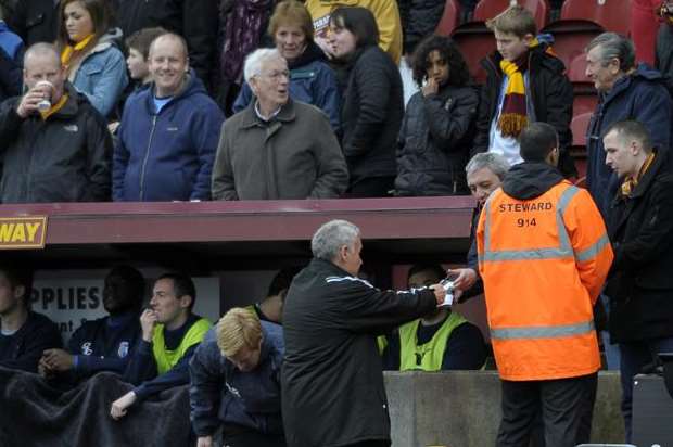 Manager Peter Taylor signs autographs for the Bradford fans Picture: Barry Goodwin