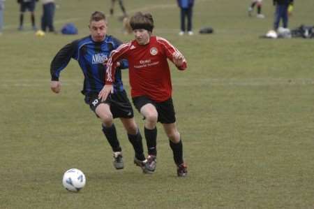 Radfall (red) go on the attack against Broomfield (blue/black)
