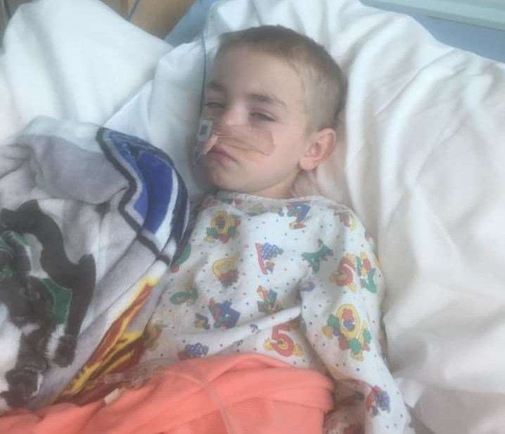 Mickey Hambly, 7, had to undergo surgery at a London hospital after swallowing some magnetic toys. Picture: Elaine Hambly