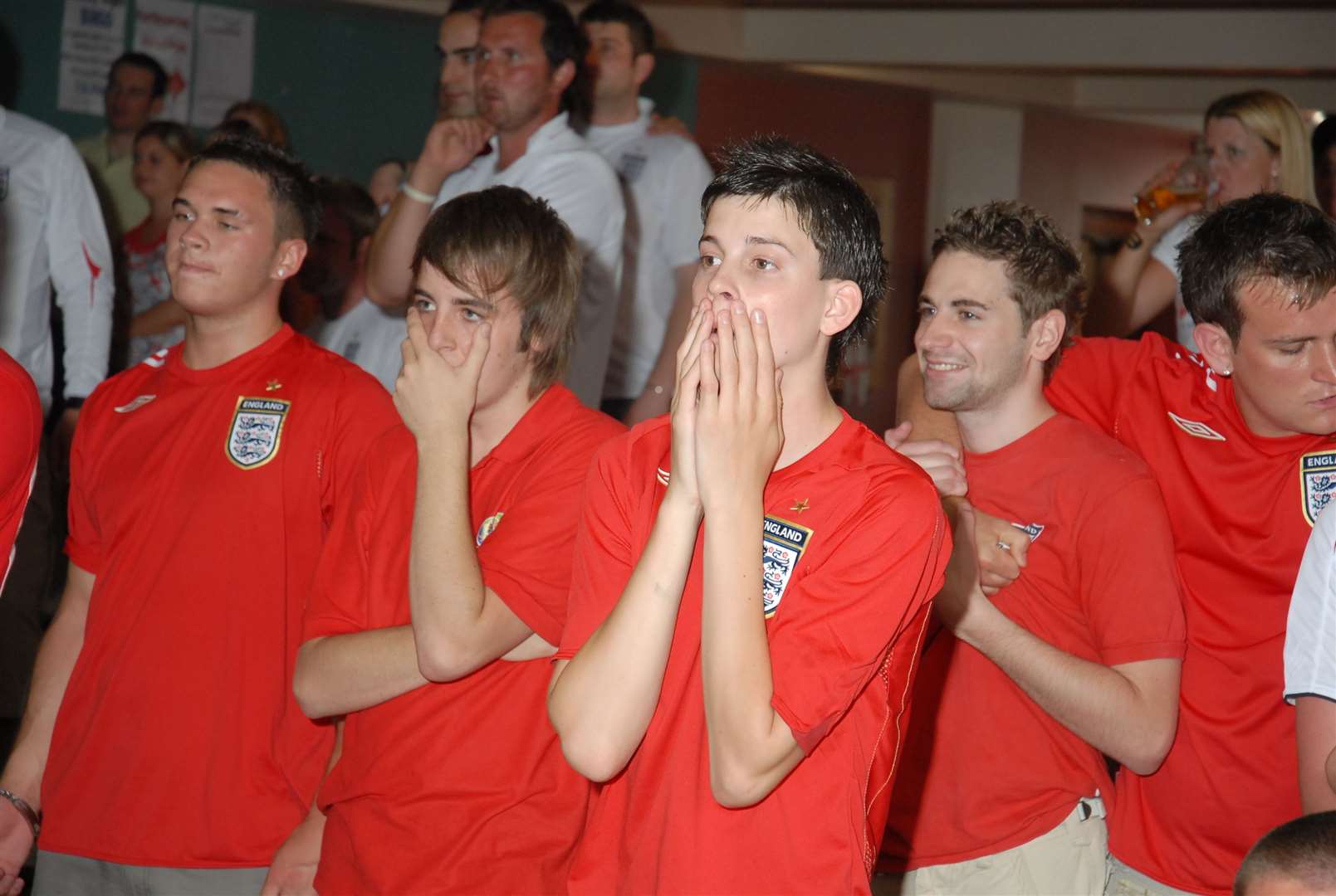 Supporters at the United Services Club, Rainham, can't bear to watch the penalty shoot-out against Portugal in the 2006 World Cup quarter final