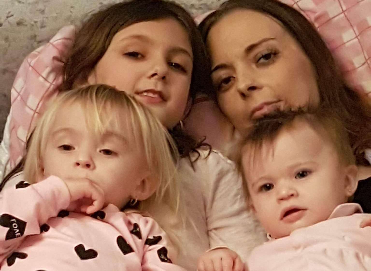 Laura with daughters Lacey, nine, Phoebe, two, and eight-month-old Libbie
