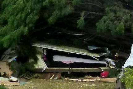 The caravan crushed by a tree in Lydens Lane, Hever. Picture: Ben Cusack / SWNS.com