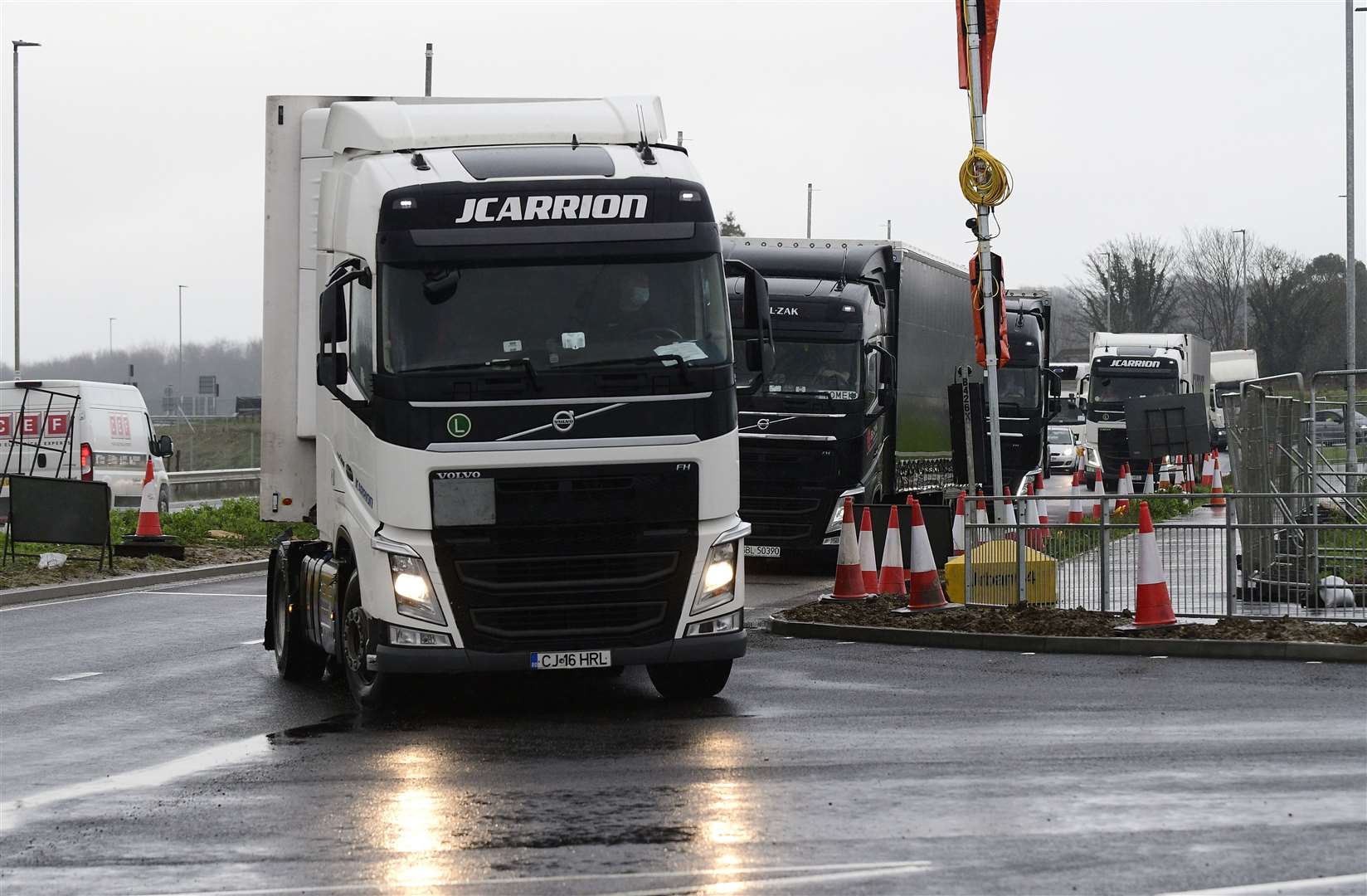 Trucks turn into the lorry park from the A2070 link road entrance. Picture: Barry Goodwin