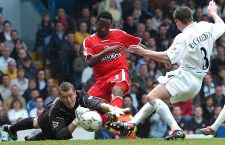 SAVIOUR: Jason Euell pounces to slot Charlton's equaliser under Leeds goalkeeper Paul Robinson. Picture: MATT WALKER