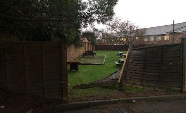 The fence surrounding the pub garden has been damaged but there was no way anyone was going to be sitting outside in the pouring rain anyway