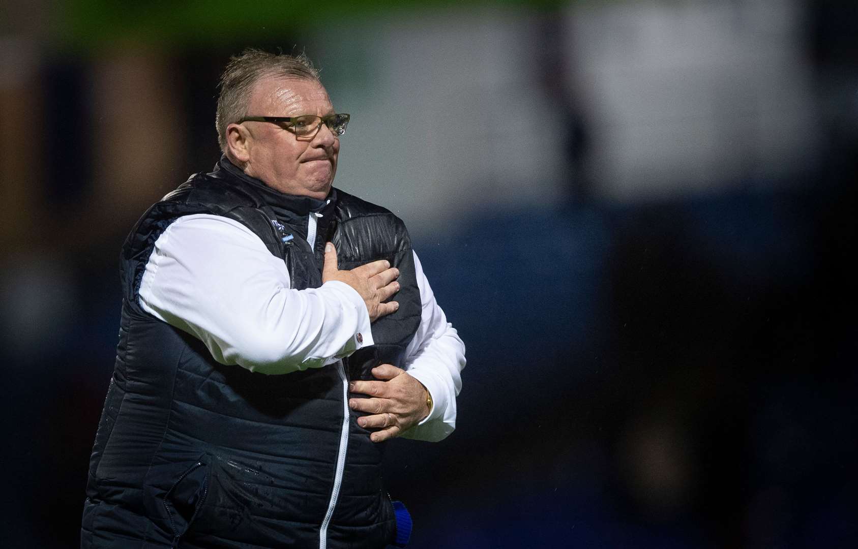 Gillingham manager Steve Evans has praised fans for their help in cleaning up the stadium