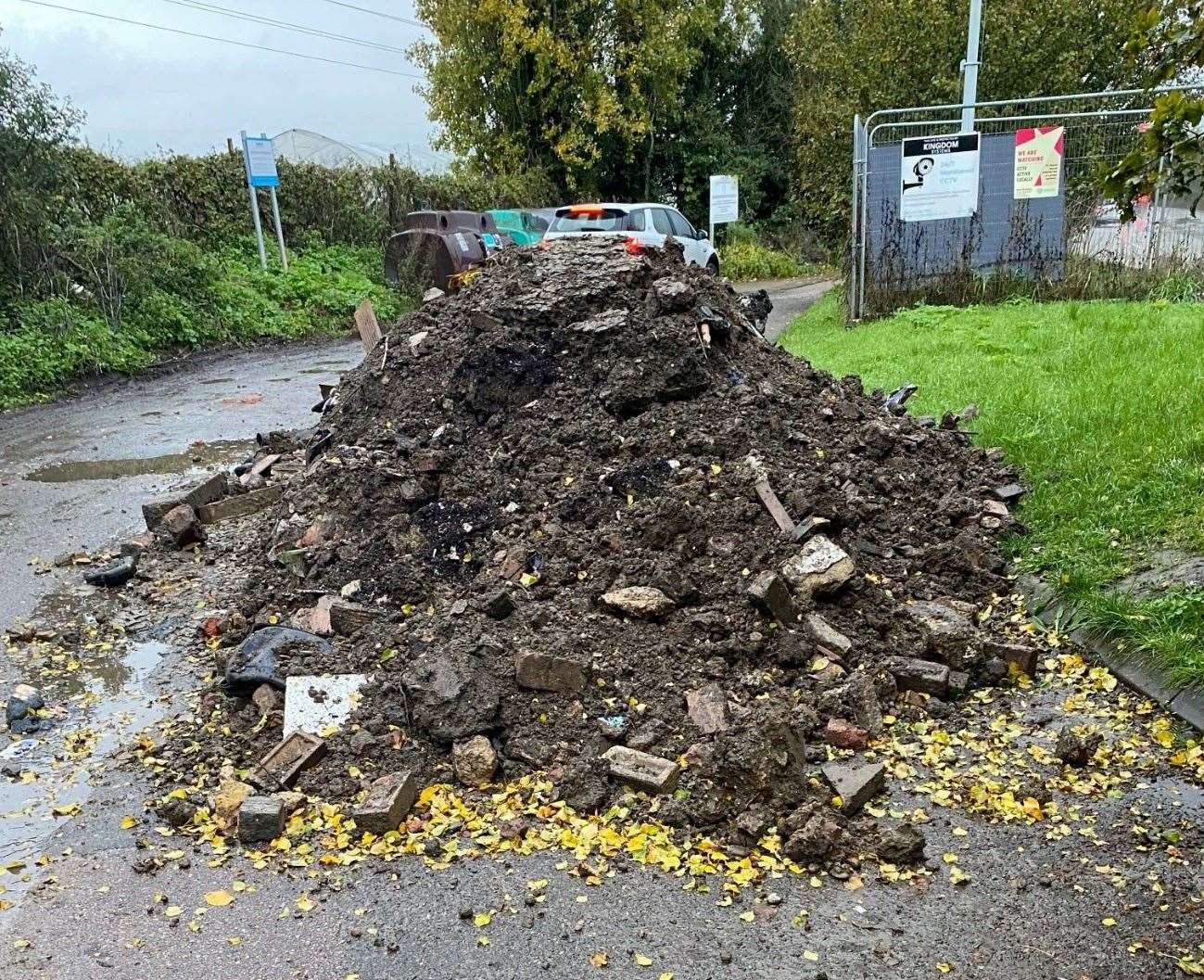 A sign warning people of the cameras can be seen behind the pile of soil. Picture: Dartford Borough Council