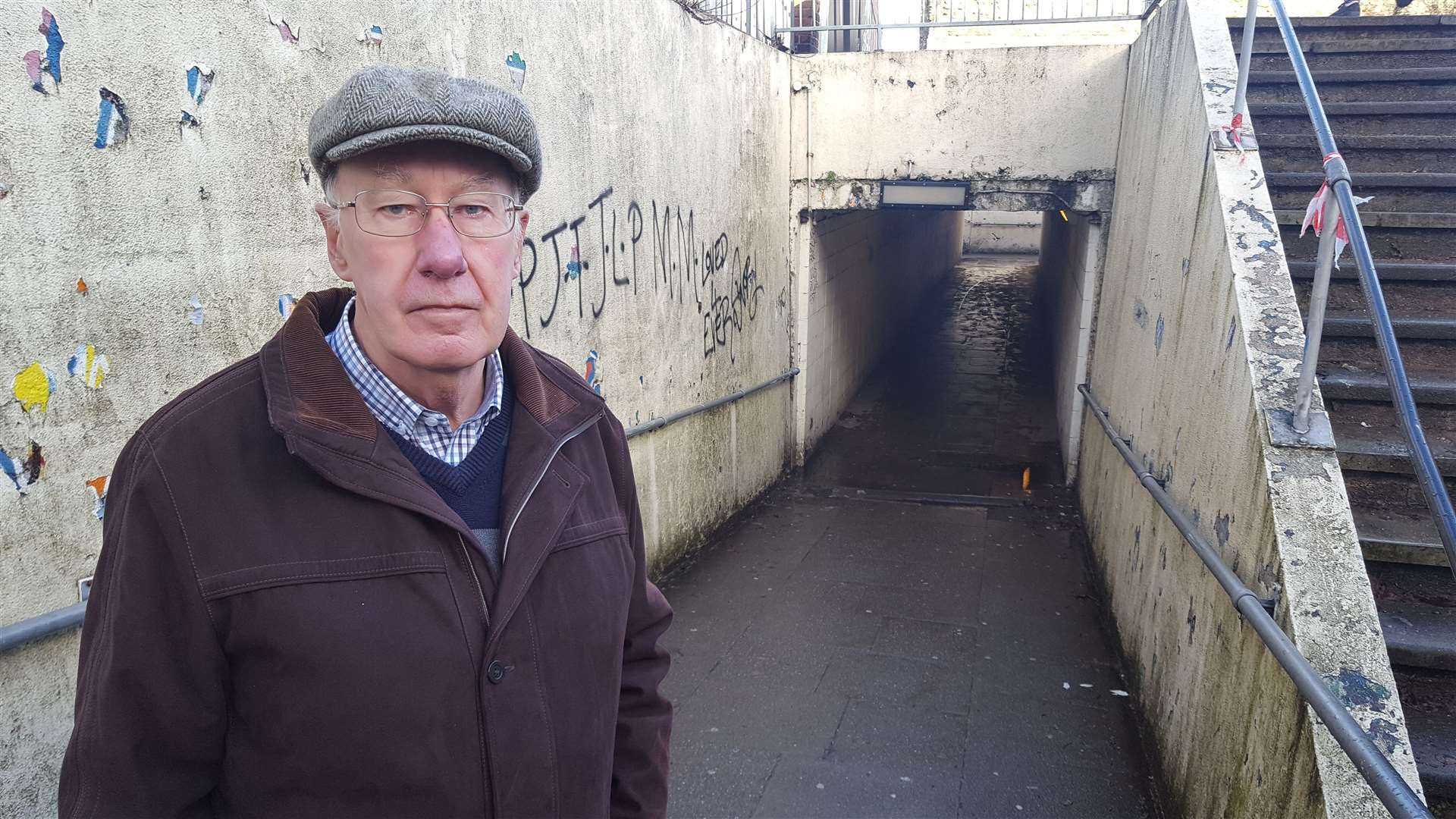 Cllr Nick Eden-Green at the rundown Wincheap underpass, which is covered in graffiti