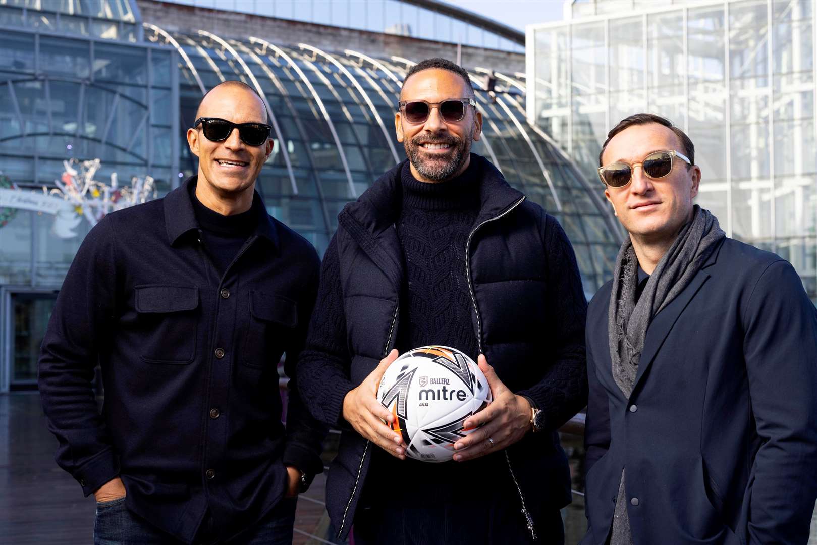 From left: Bobby Zamora, Rio Ferdinand, and Mark Noble at the shopping centre. Picture: David Parry/PA Wire