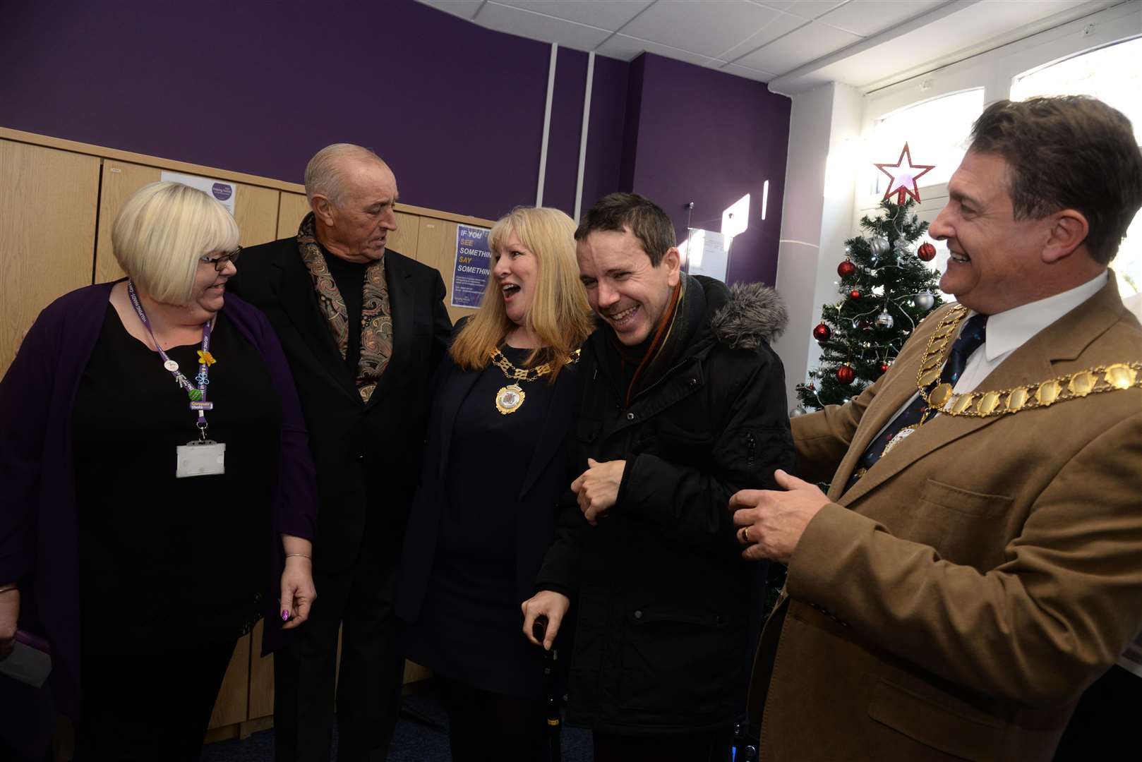 Len Goodman shares a joke with manager Michelle Sringer, and others at the opening, picture: Chris Davey