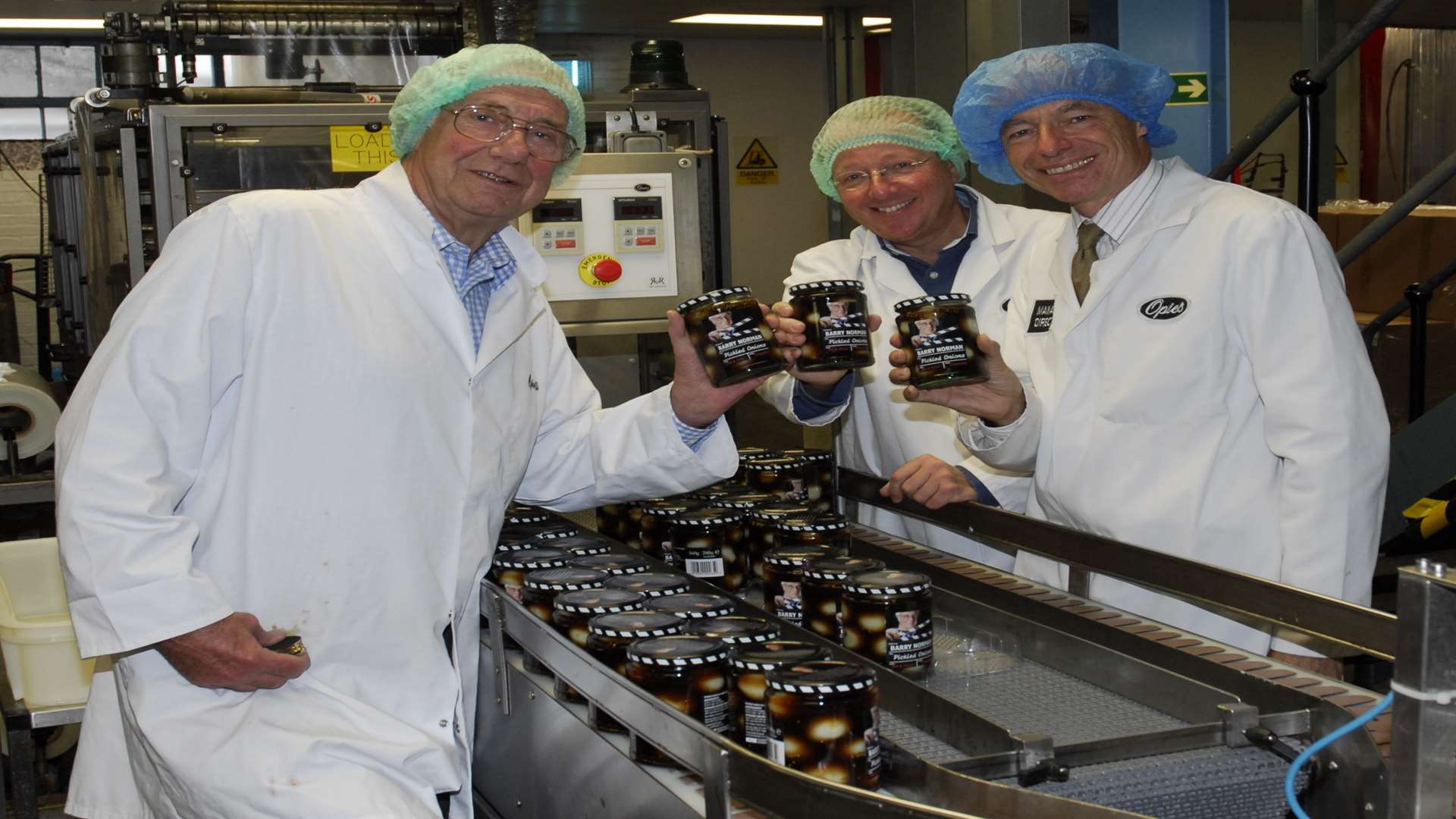 From left, Barry Norman, John Wringe and William Opie with the jars of pickled onions