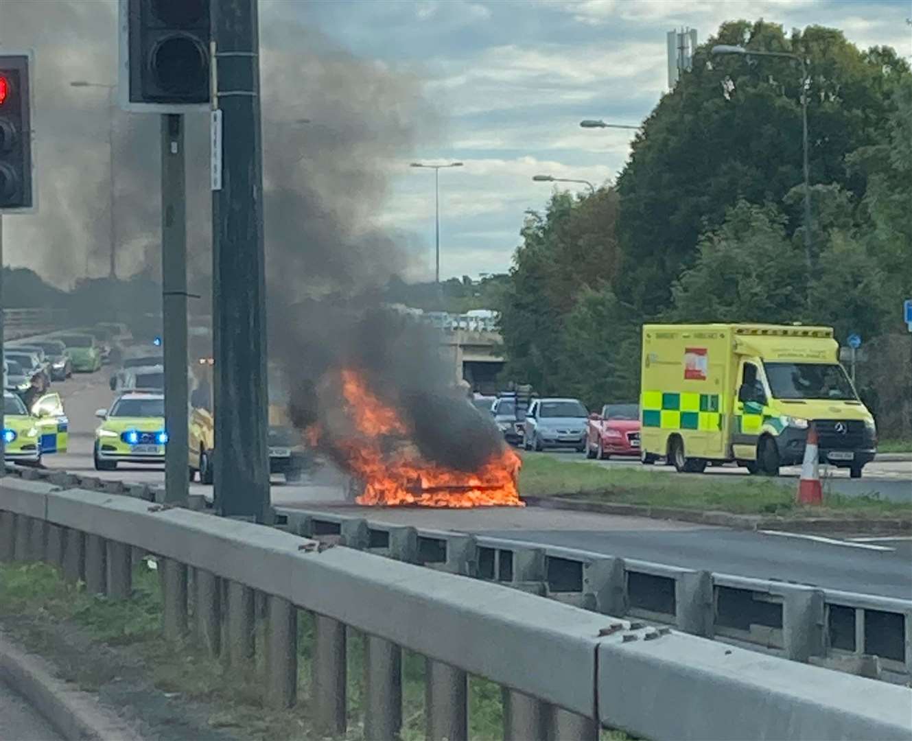 The moment a driver spots the vehicle on fire on her way to work. Picture: Heidi Brett