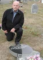UPSET: Alfred Brown beside a fallen headstone. Picture: JENNY ROUND