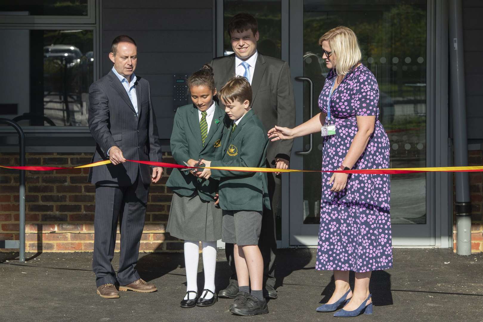 The opening ceremony for the new Platt School: chairman of governors Paul Vallence, Cllr Matt Boughton and Jenna Crittenden, with head girl and boy Annalise Eckersley andJames Benedikz. Picture: Scott Wishart