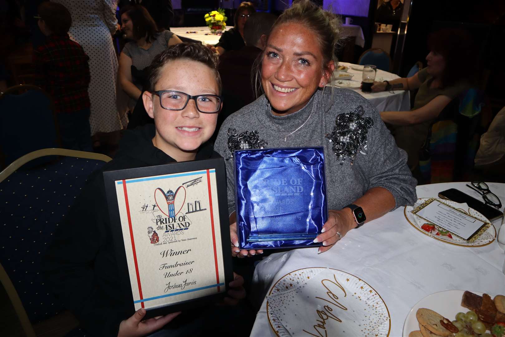 Joshua Jarvis, 11, pictured with his mum Lorraine, was named under-18 fundraiser with Harvey Servant in the Tesco Pride of the Island awards