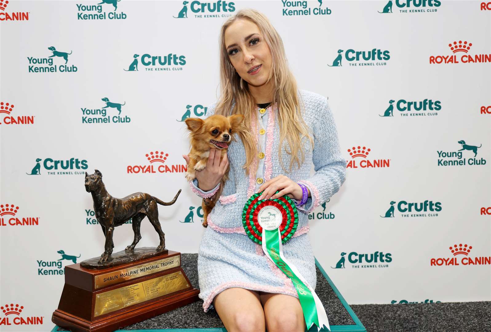 Izzy King with River, a Chihuahua (Long Coat). Picture: Beat Media/The Kennel Club