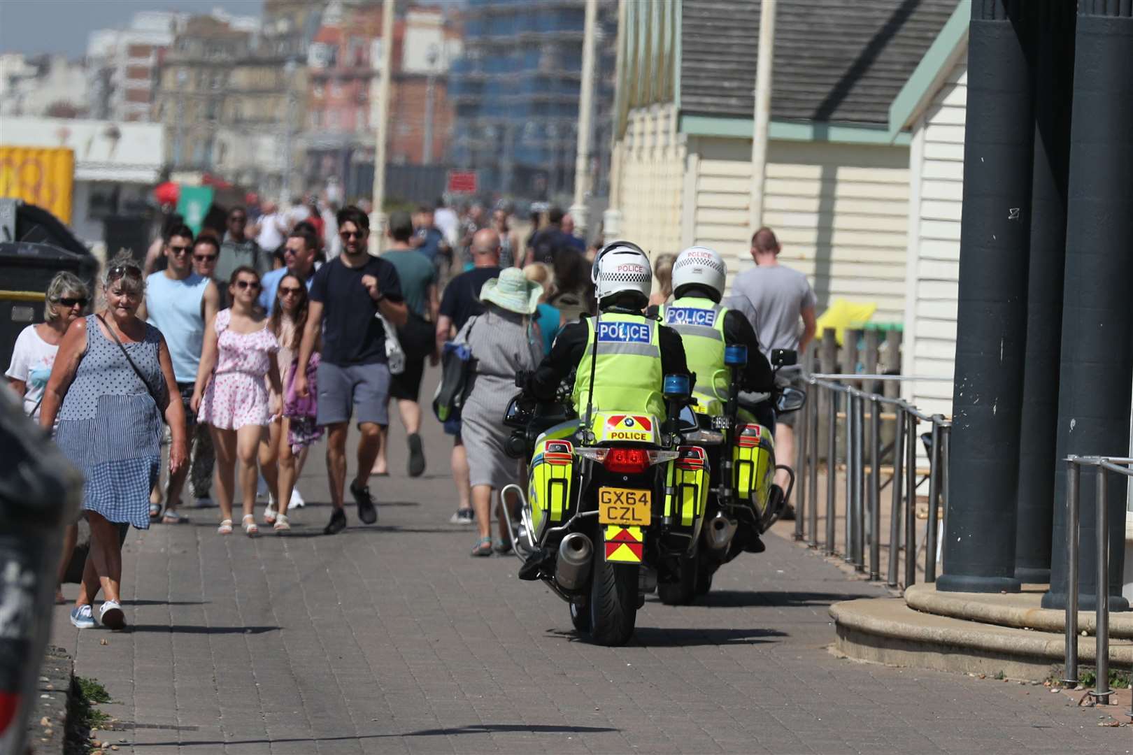 Police have been out in force to monitor numbers on promenades and beaches (Steve Parsons/PA)