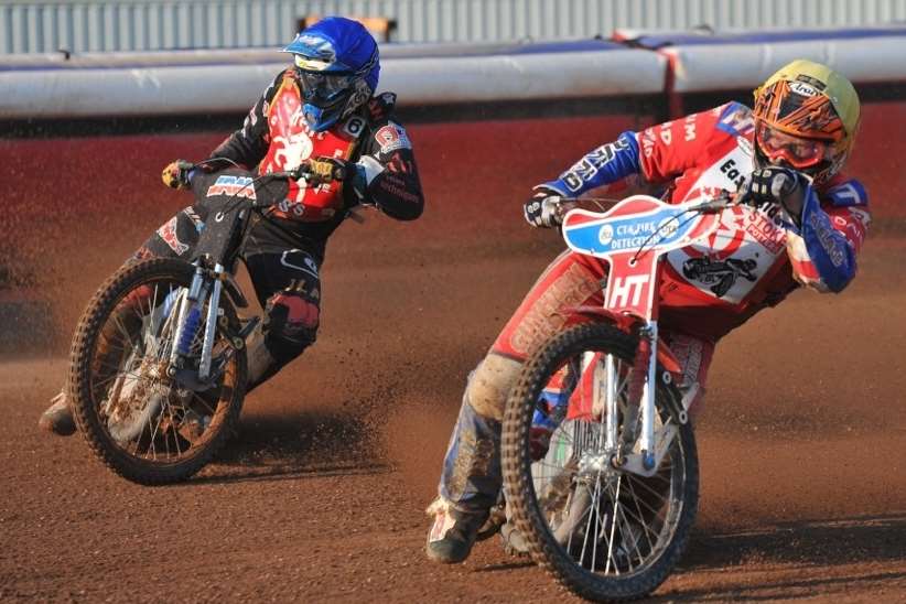 Kent's Danny Ayres pursues Stoke's former Kings rider Adam Kirby at Central Park on Monday night Picture: Elizabeth Leslie