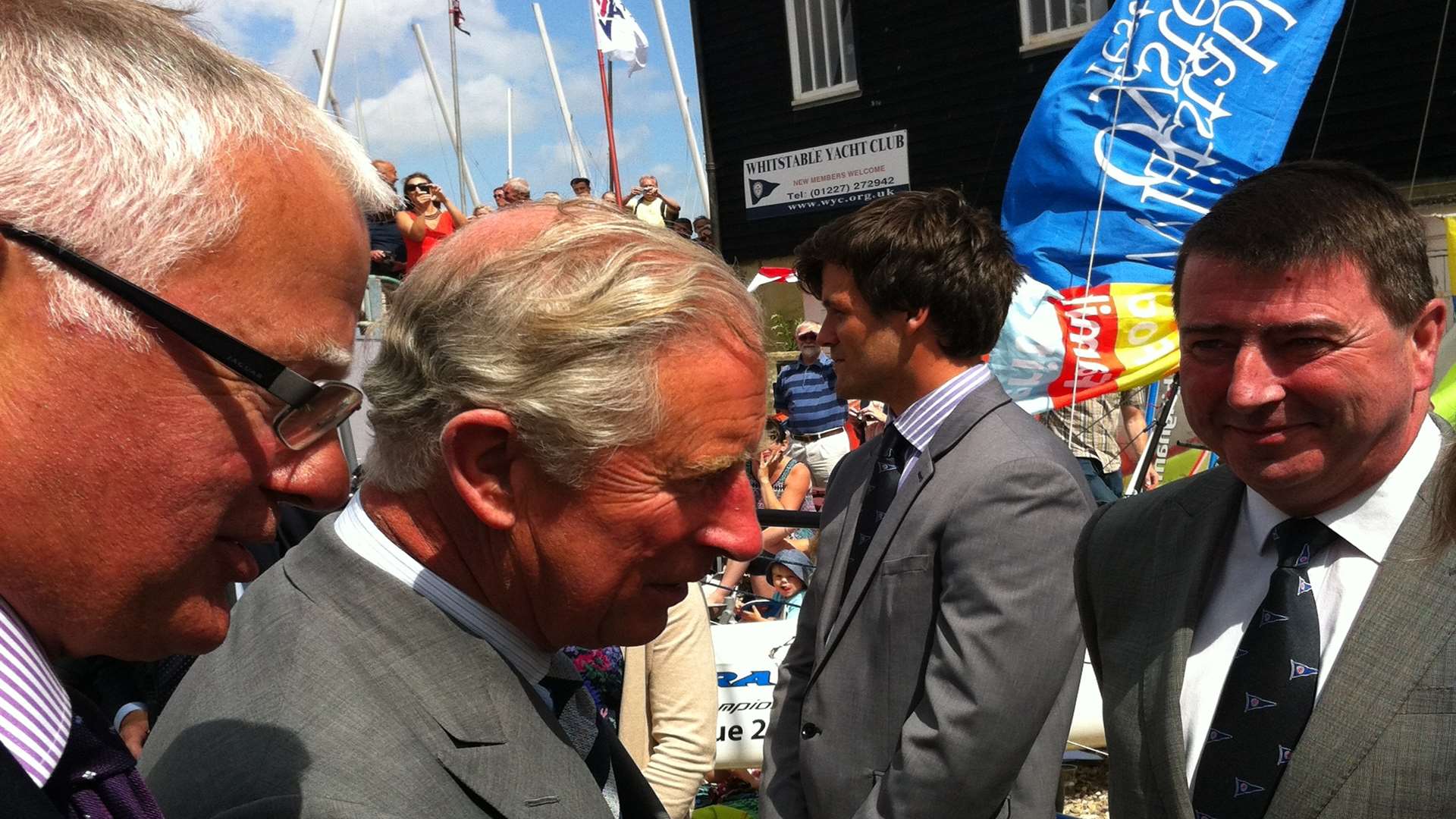 Charles meets members of the Yacht Club