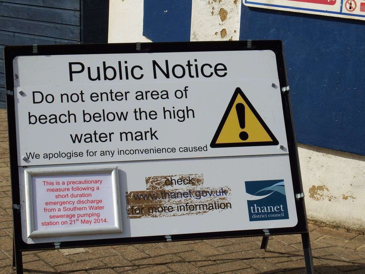 A sign warning people not to go on the beach below the high water mark after sewage was pumped into the sea. Picture: Mike Pett