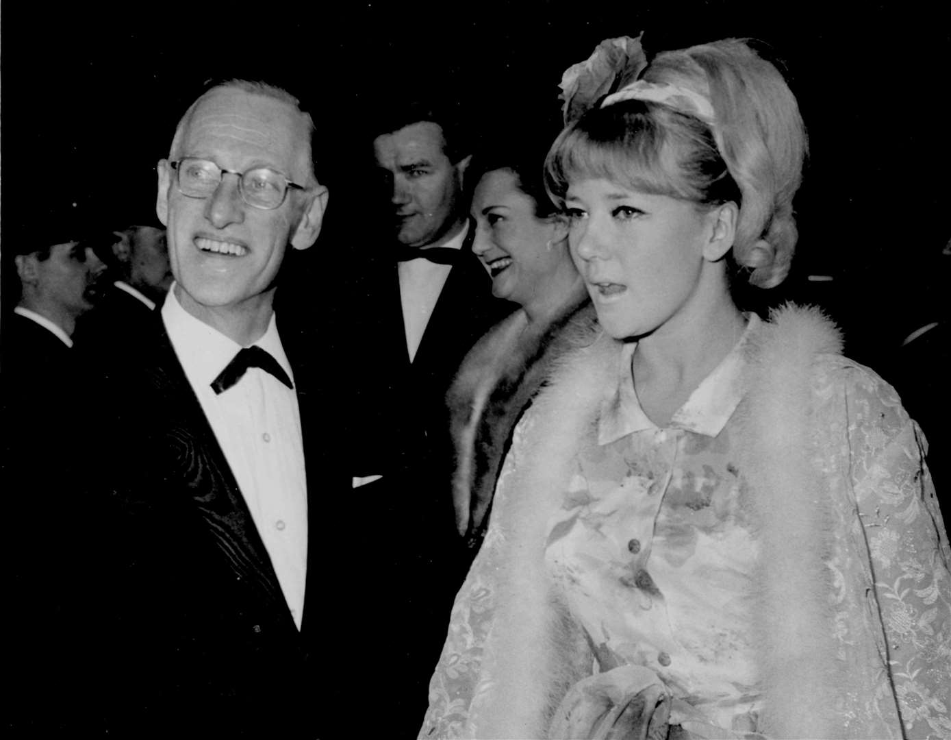 Steptoe Snr (AKA Wilfred Brambell) escorts actress Julia Foster to the ABC Cinema in Canterbury for the provincial premiere of Becket in April 1964. Other guests included Ronald Fraser and Charles Hawtrey. The cinema site in St George's Place is now home to the Odeon, used as a vaccine centre during the Covid pandemic