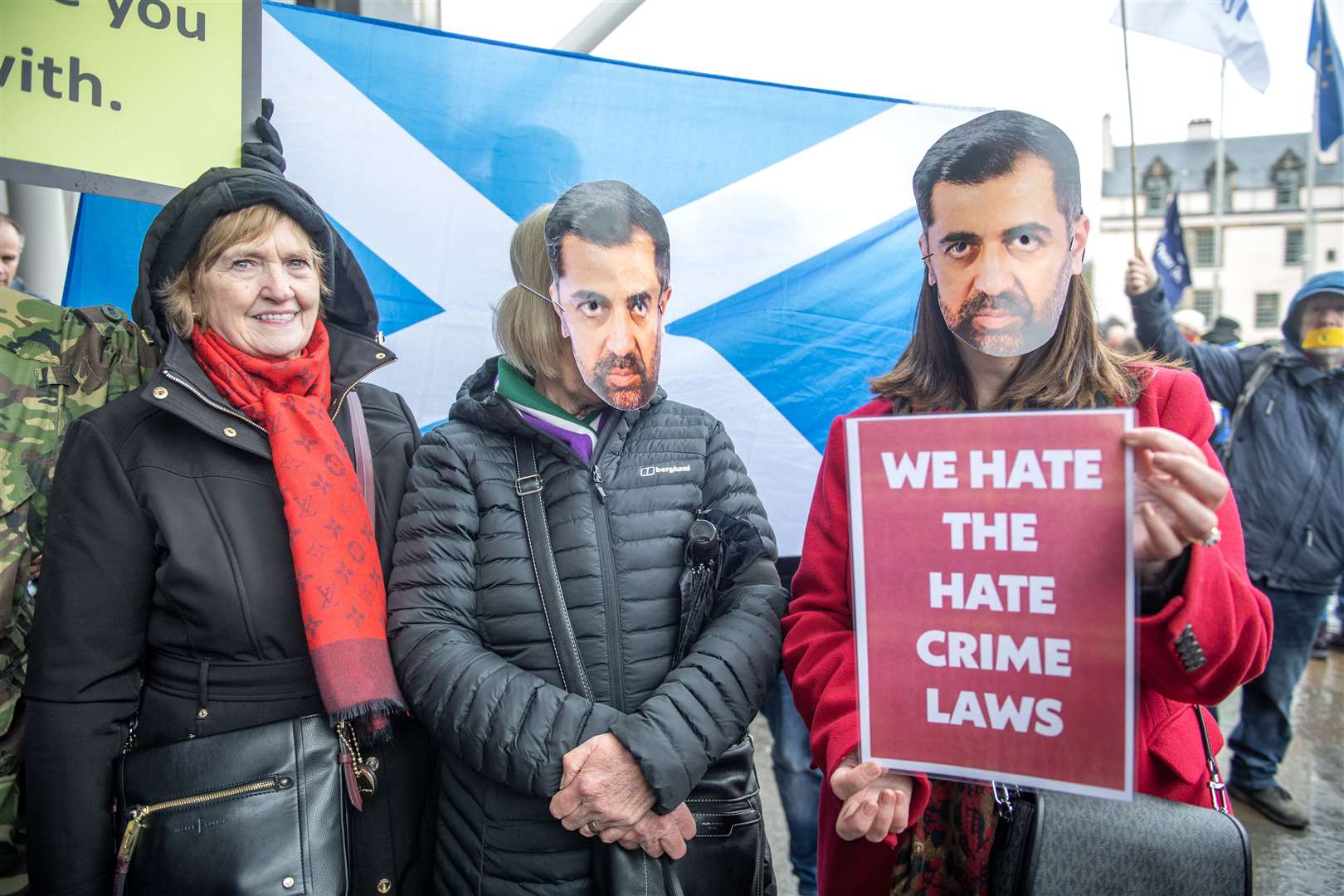 Campaigners gather outside the Scottish Parliament at Holyrood (Lesley Martin/PA)