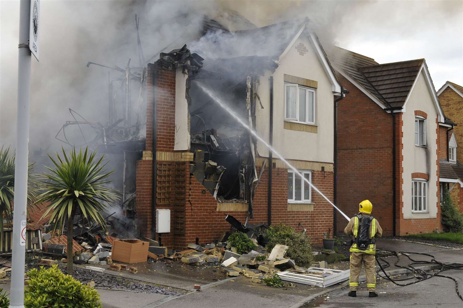 The road was cordoned off as fire crews attended to flames. Picture: Andy Payton