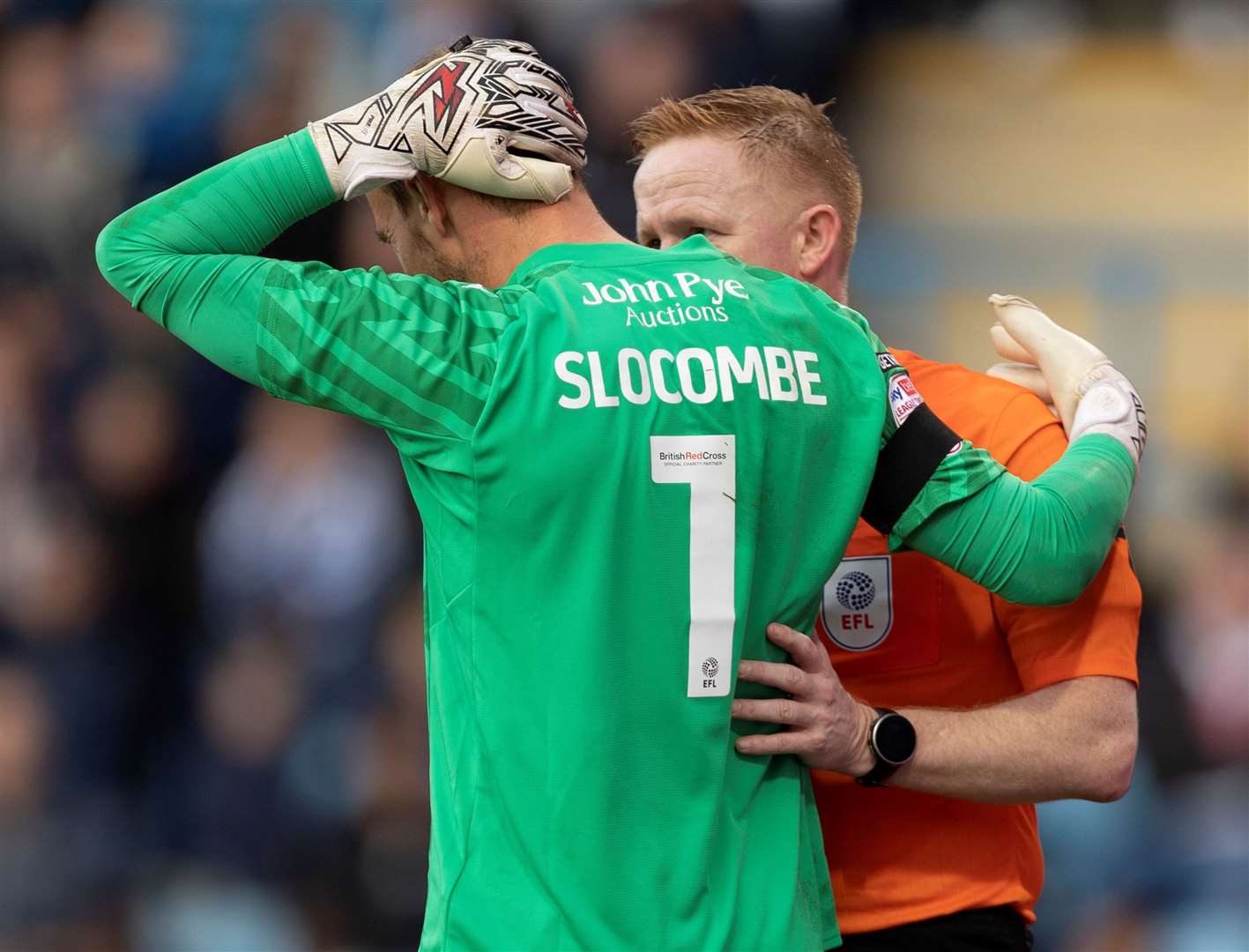 Notts County goalkeeper Sam Slocombe talks with referee Alan Young Picture: @Julian_KPI