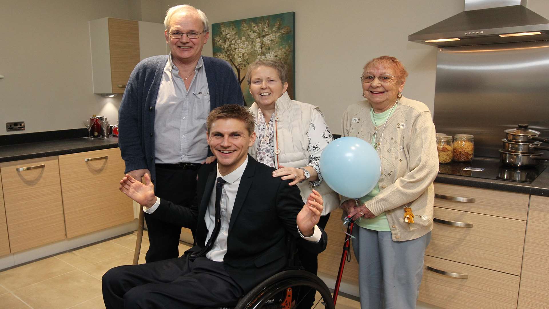 Residents John Blunden, his wife Rita and Marina Finnis with Paralympian Steve Brown