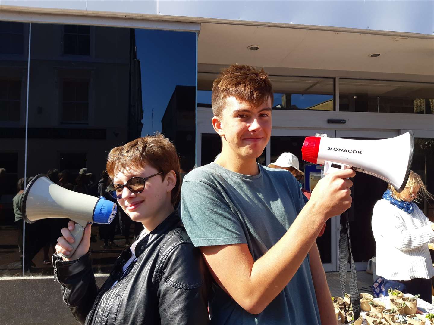 Vivien Hardy and Sam Brookfield chant 'There's no planet B' to passers-by in Deal High Street