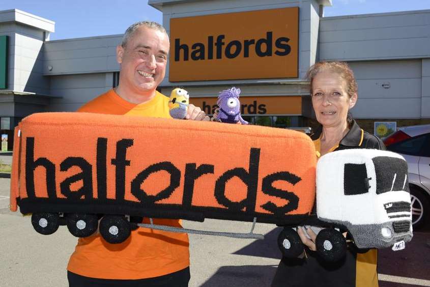 Karen Buckle and colleague Mark Barron with the Halfords truck she knitted