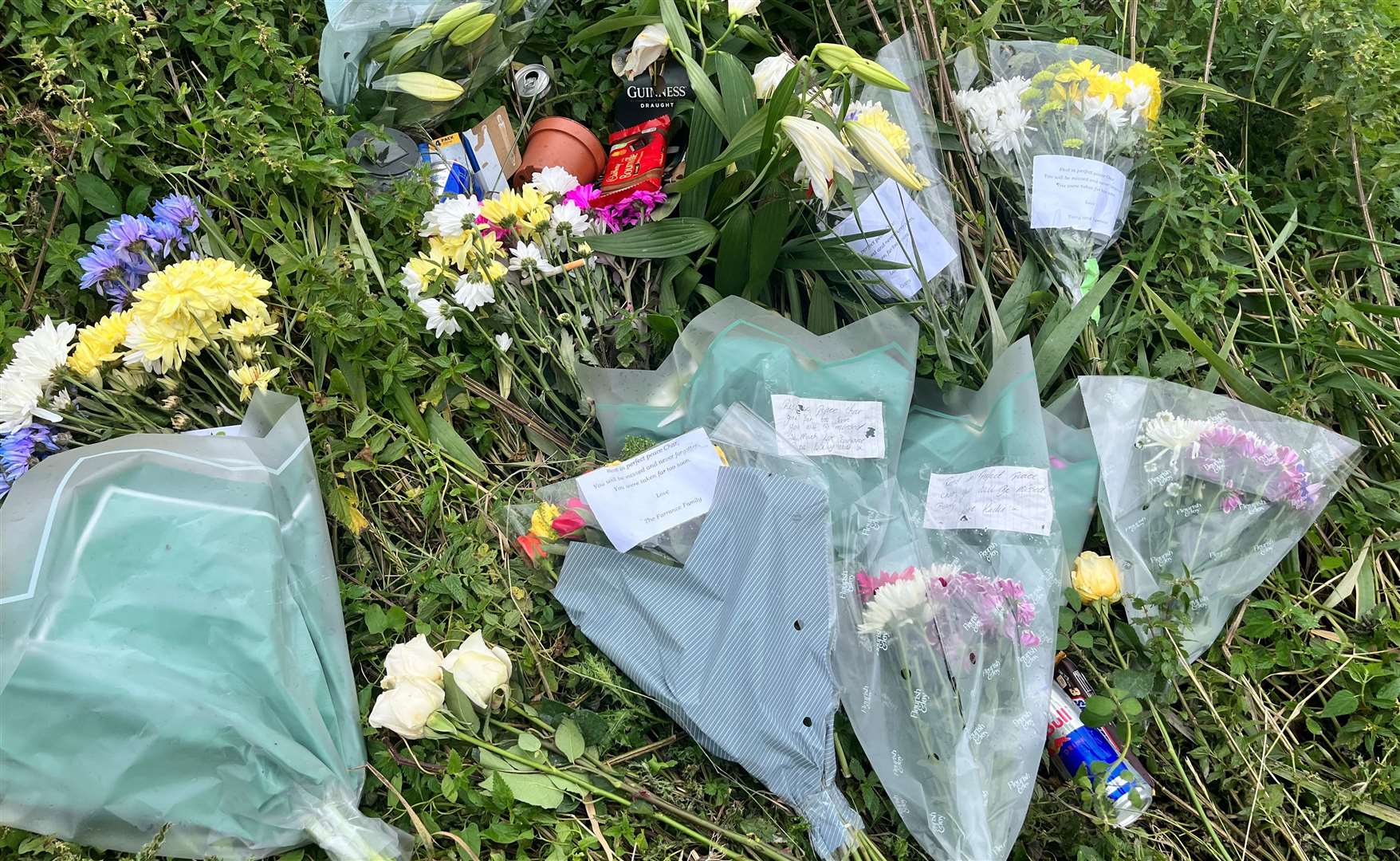 Floral tributes have been left at Ham Mill Lane, where the tragic crash happened