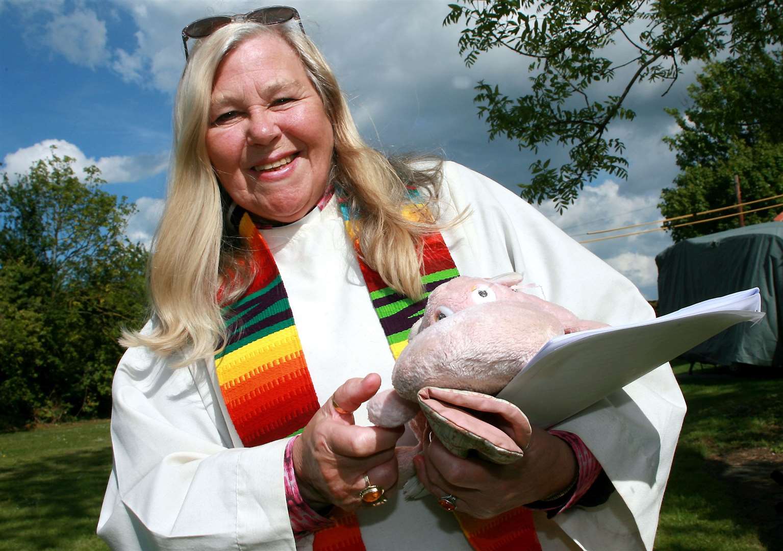 The Rev Cindy Kent conducting a thanksgiving service for pets in the grounds of Minster Abbey, Sheppey, with her pink toy hippo Henrietta. Picture: Phil Lee