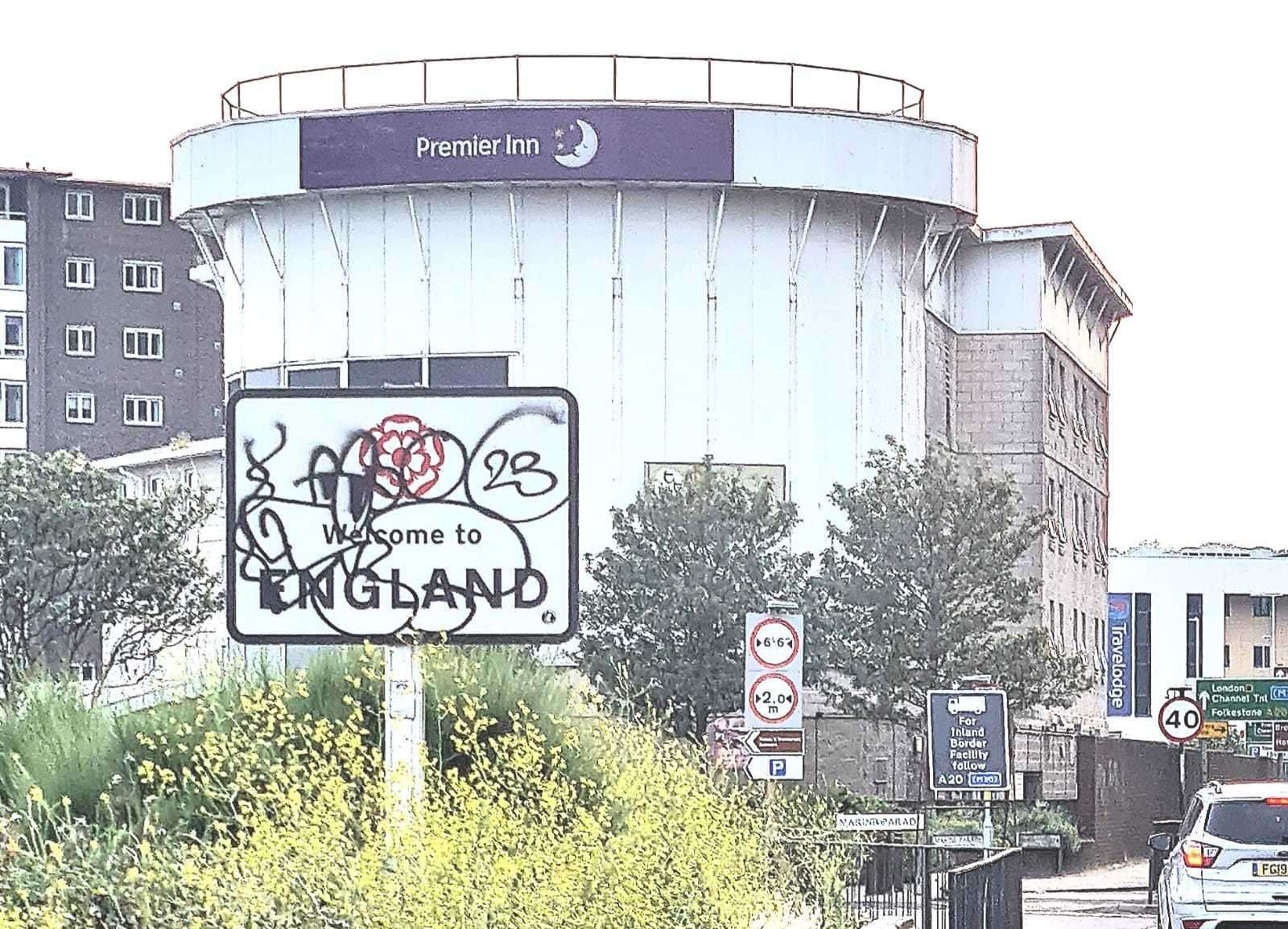 A sign welcoming travellers to England has been covered in graffiti along the A20 in Dover. Picture: Sean Irwin