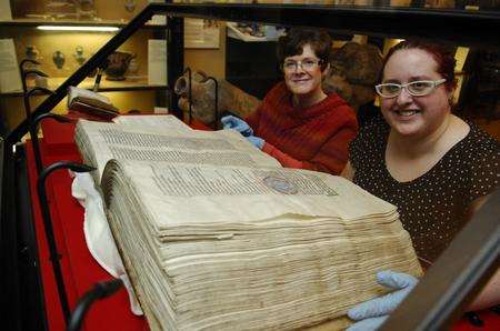 Registrar Clare Caless, left, and collections officer Sam Harris with the Lambeth Bible at Maidstone Museum