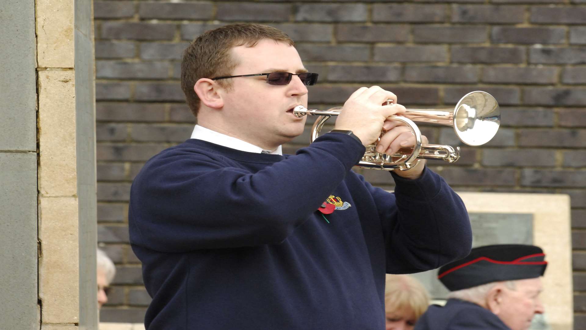 The Last Post is played by a bugler