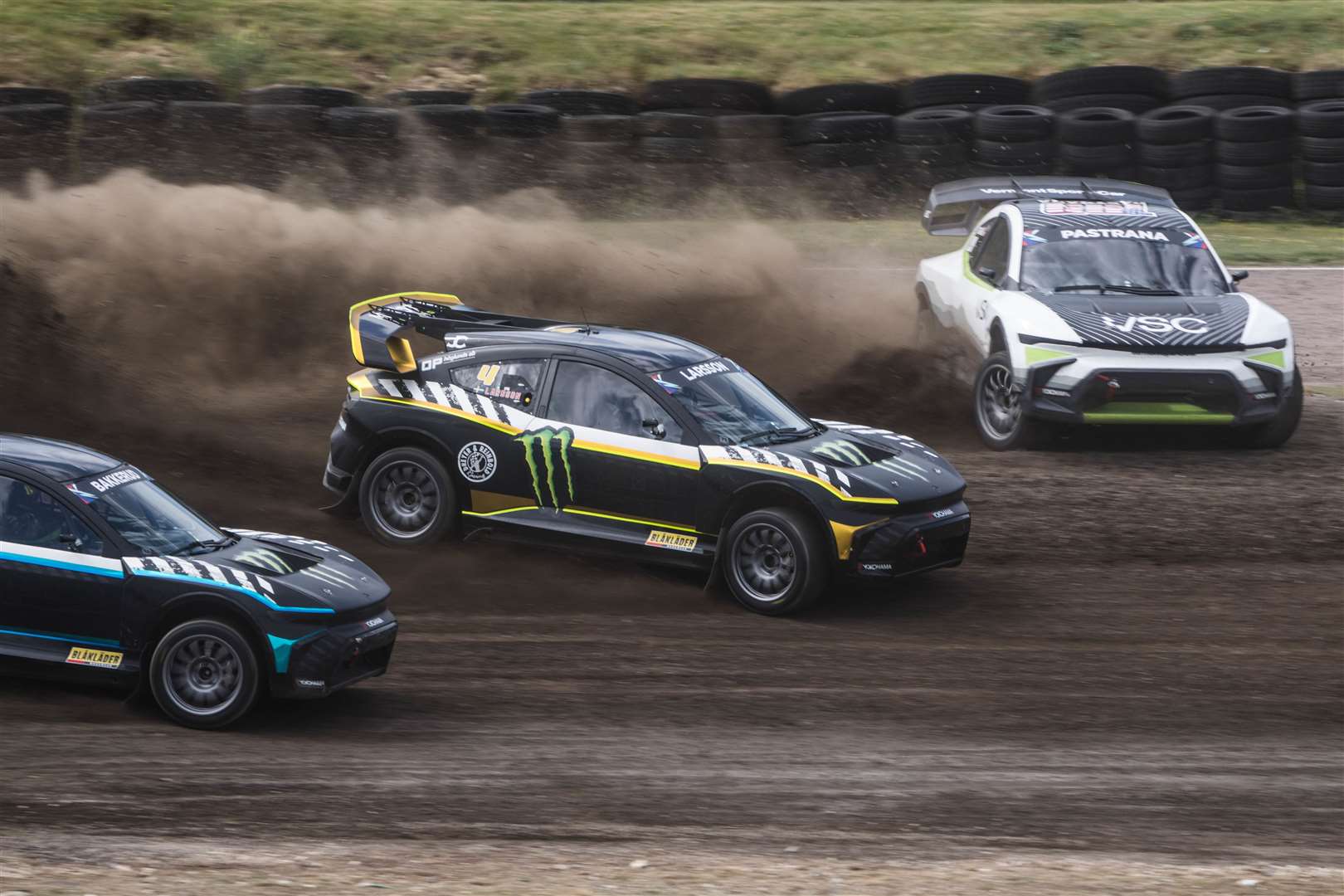 Larsson, centre, produced a commanding drive in the final. Picture: Nitro Rallycross
