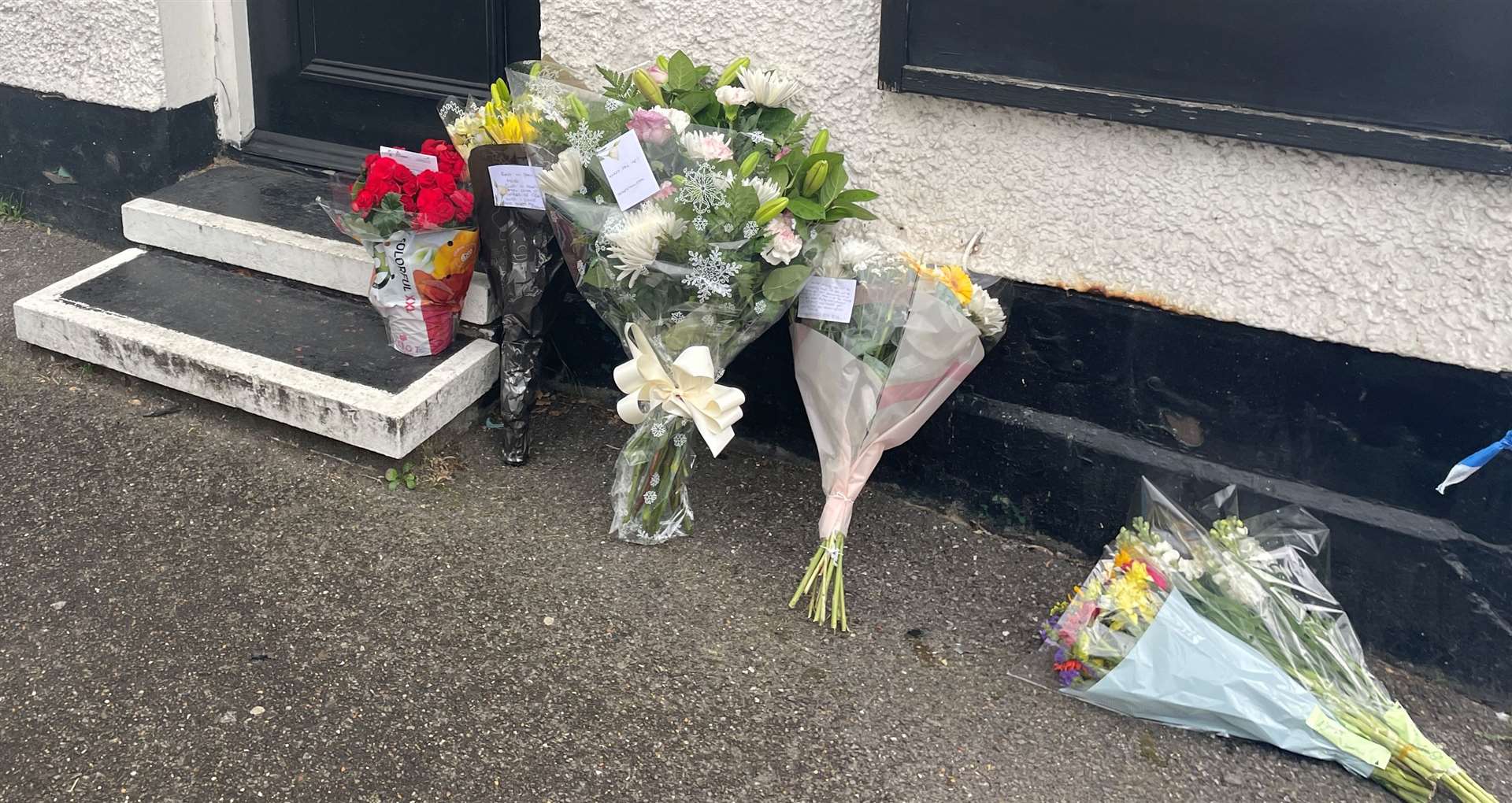 Floral tributes were left at the pub after landlord Matthew Bryant died