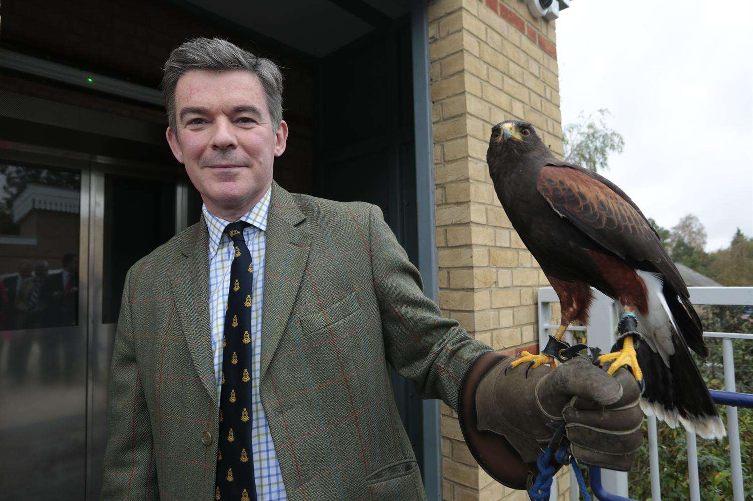 MP Hugh Robertson opens the lifts with a Harris hawk from Leeds Castle