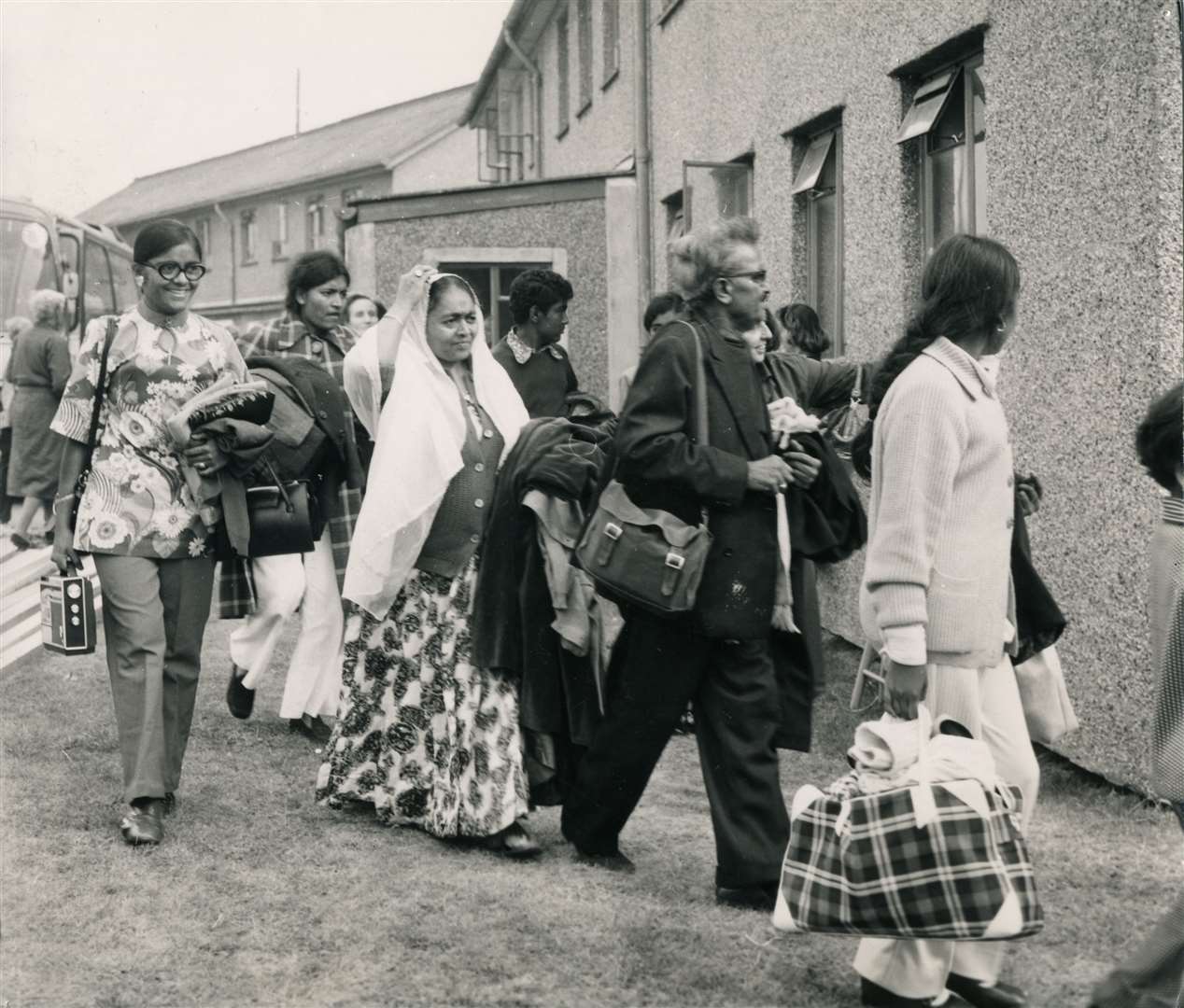 Ugandan refugees arriving at Greenham Common