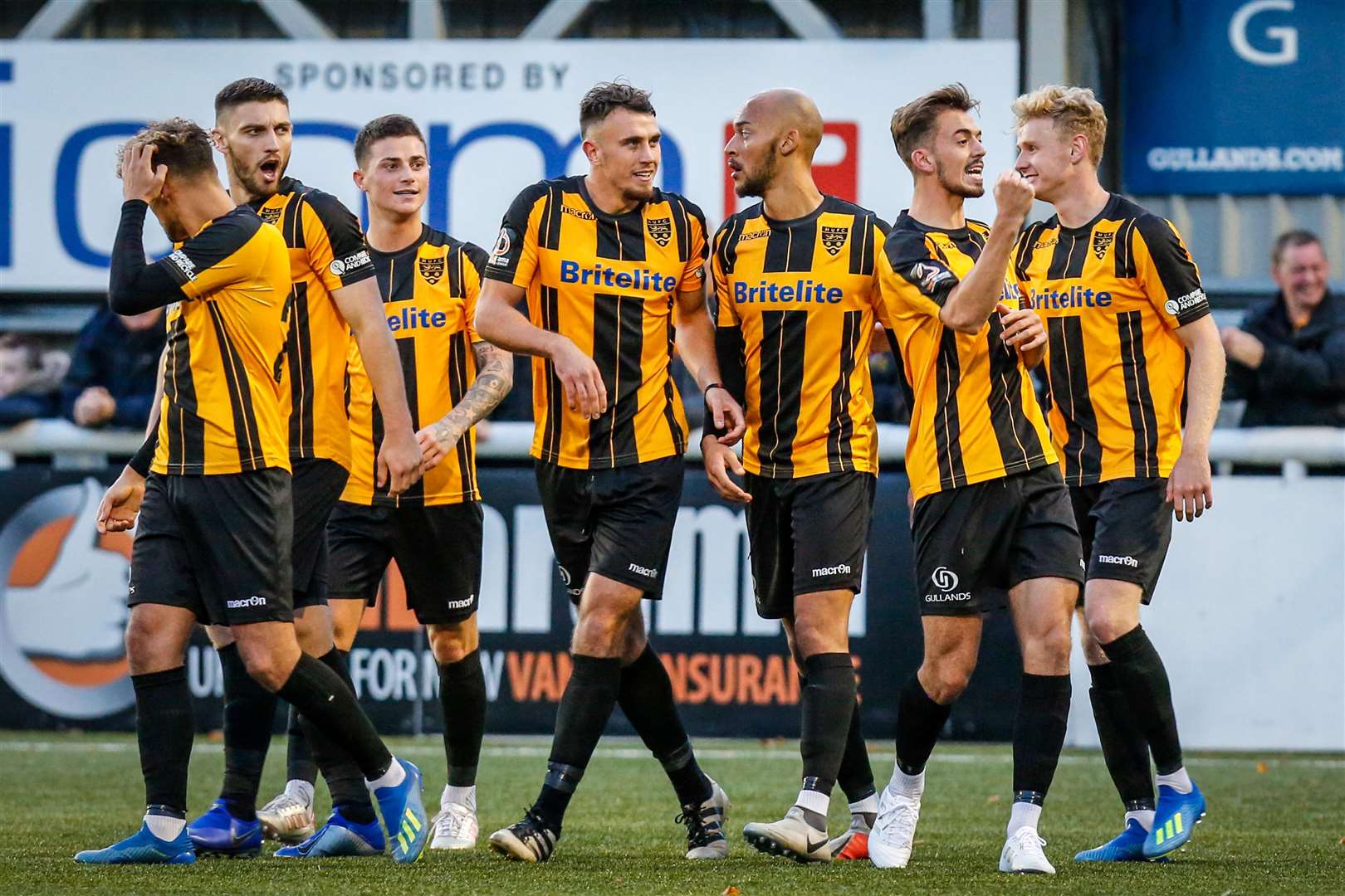 Jack Powell, second from right, celebrates his goal for Maidstone against Macclesfield Picture: Matthew Walker