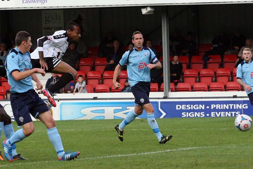 Dover striker Ricky Modeste proved a handful for the Rushden & Diamonds defence. Picture: Terry Scott