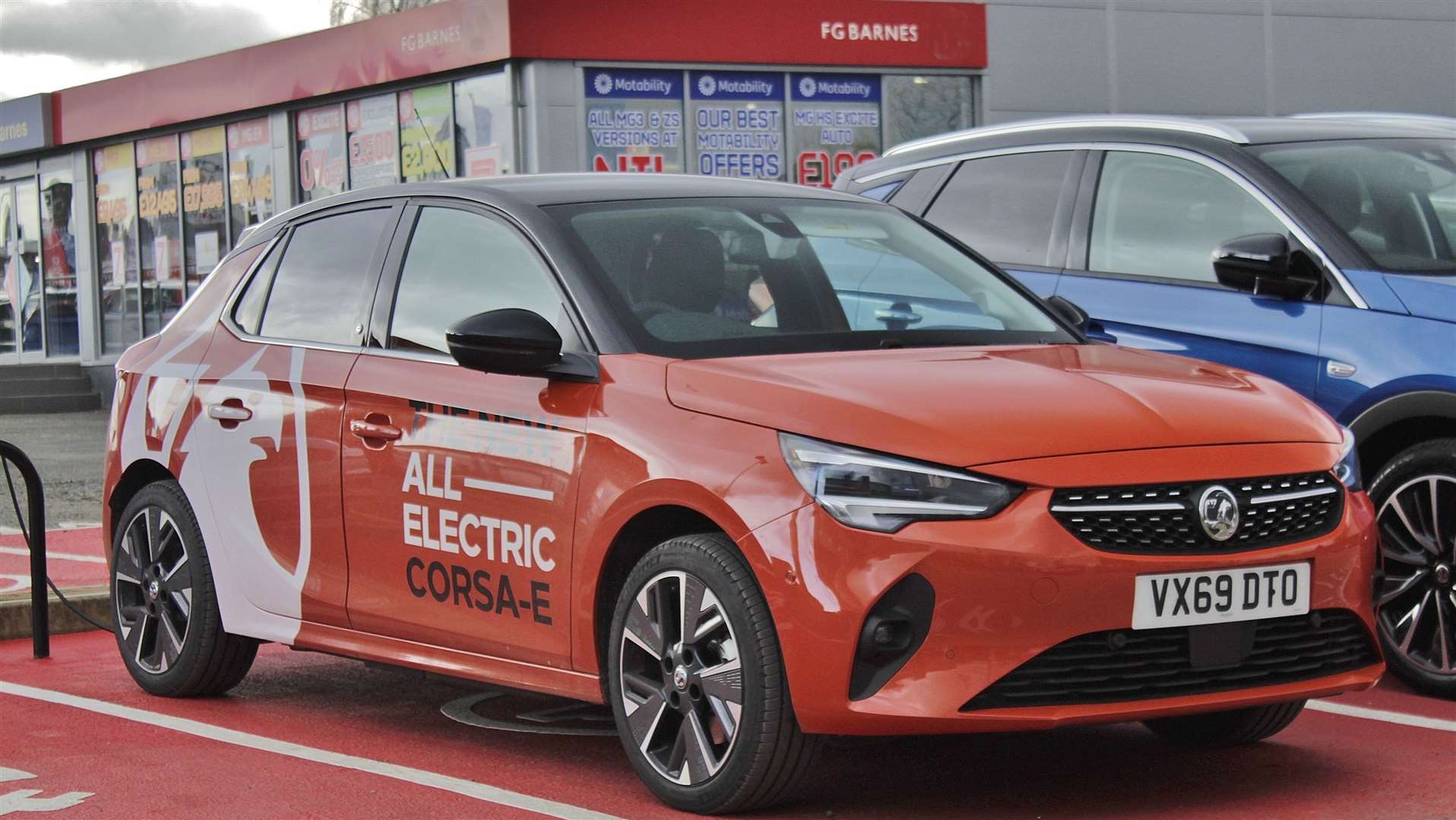 For electric cars like this Vauxhall Corsa-e available from FG Barnes, there are no congestion charges or car tax to pay while many councils offer free parking.