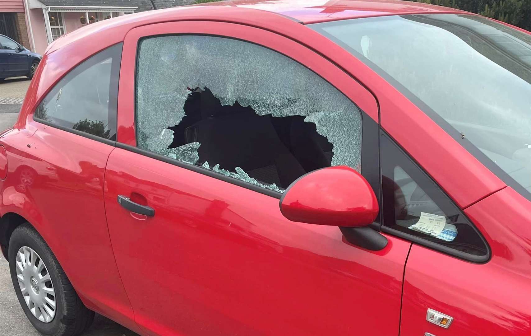 Sarah Mitchell's car window was smashed after being hit