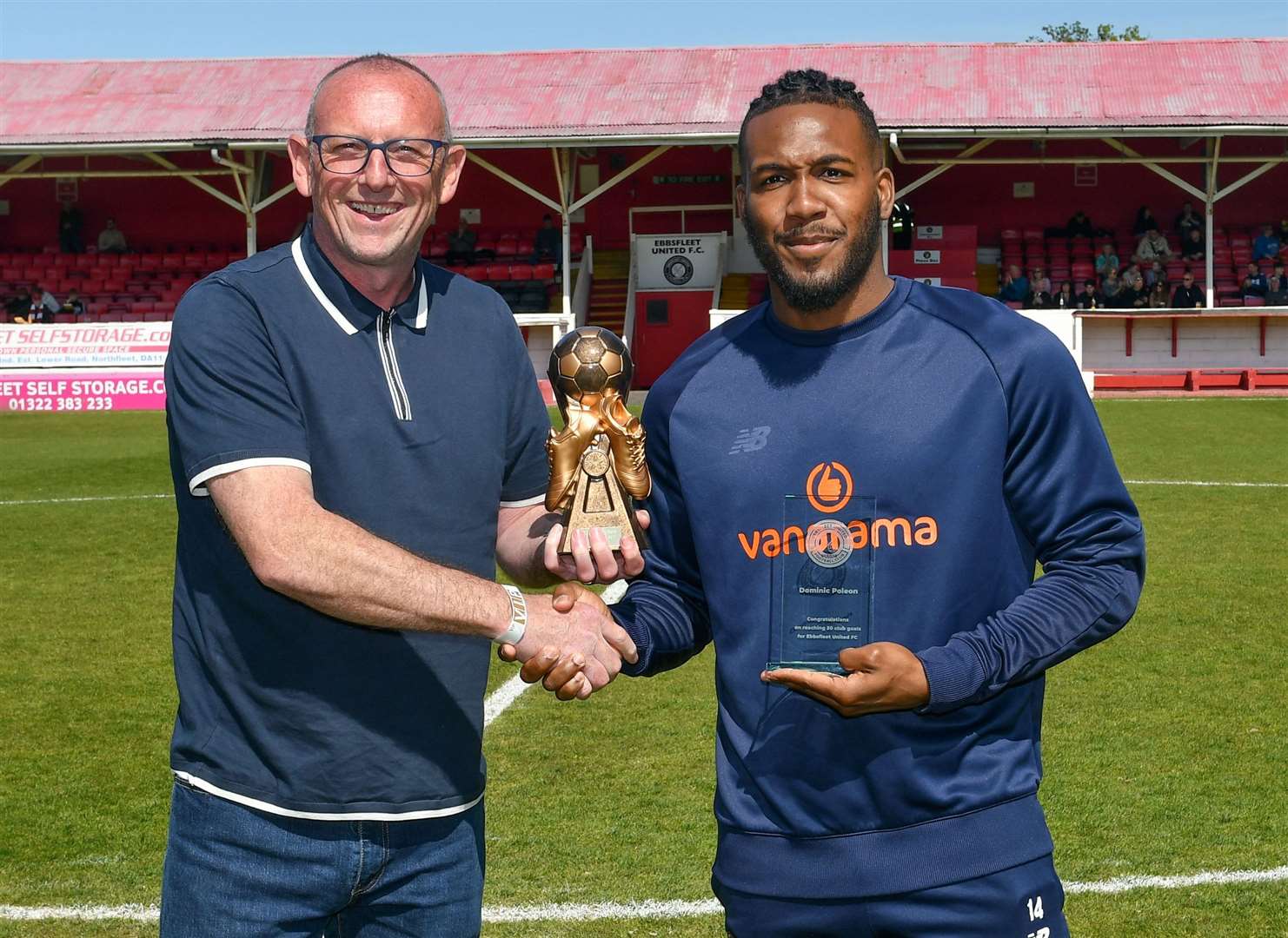All-time Fleet record scorer Steve Portway presents 2022/23 top scorer Dominic Poleon with his golden boot - as well as an award for reaching 50 club goals. Picture: Dave Plumb/Ebbsfleet United FC