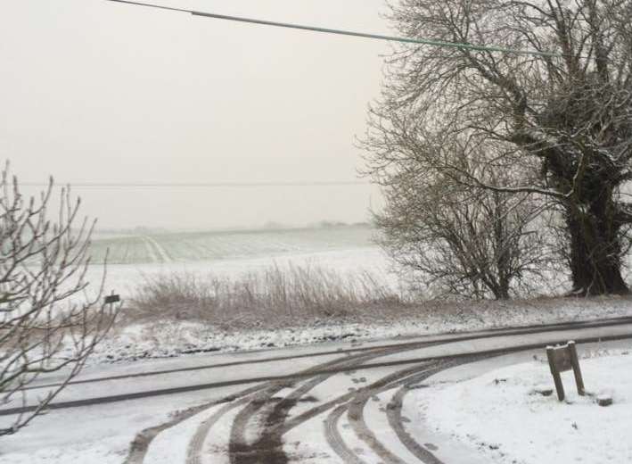 John Sheridan who sent this picture in said light flurries continue in Whitfield this morning