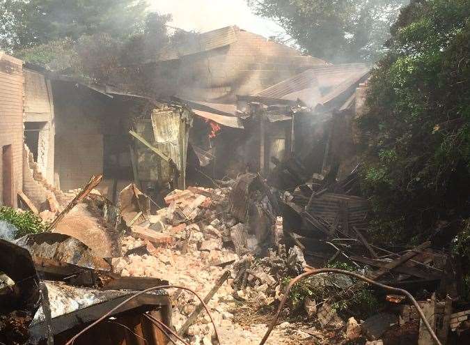 The smouldering remains. Picture: Kent Fire and Rescue.