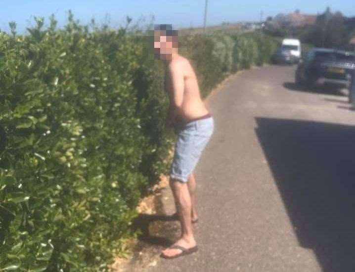 A man is caught short and uses a bush as a toilet. Picture: Friends of Botany Bay and Kingsgate