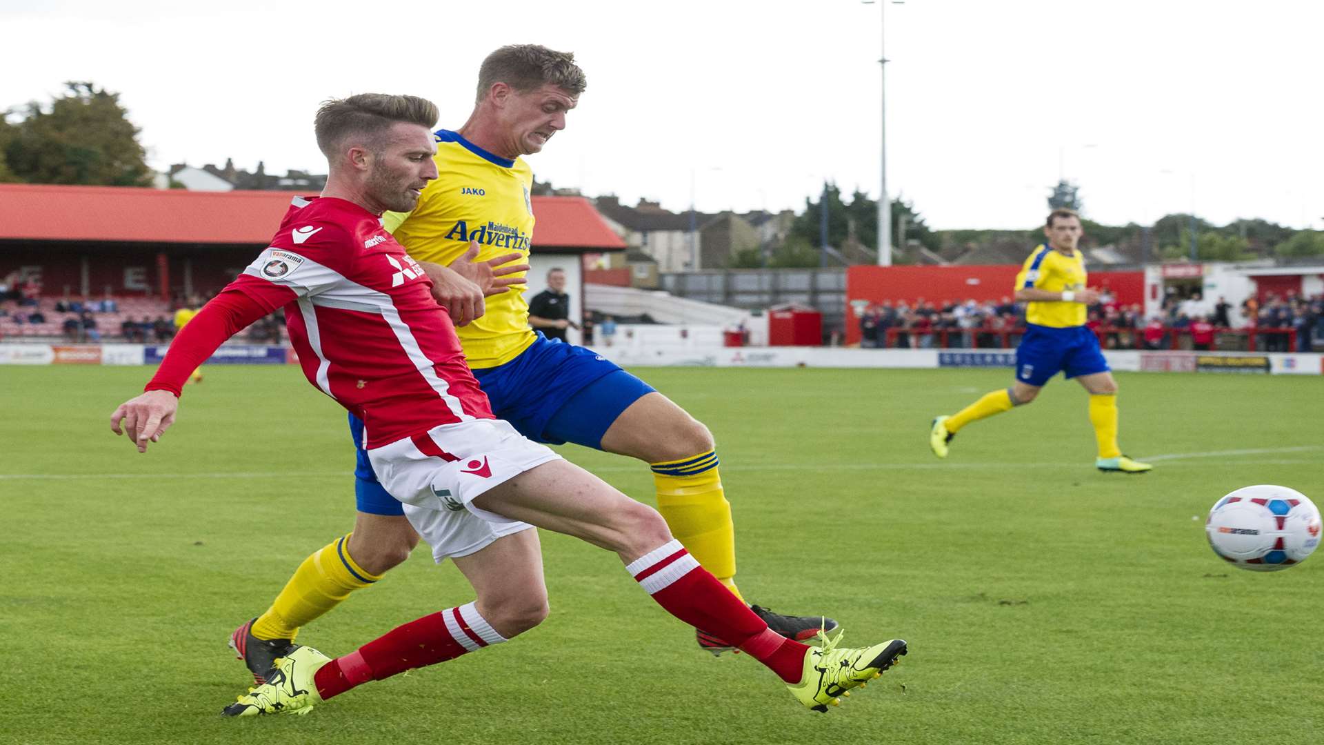 Matt Fish gets away from Alan Massey to cross from the Ebbsfleet right Picture: Andy Payton
